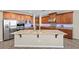 Large kitchen island with granite countertops and a breakfast bar at 3324 Tranquil Garden St, Las Vegas, NV 89117