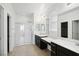 Primary bathroom with double vanity and walk-in shower at 391 Mano Destra Ln, Henderson, NV 89011