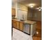 Kitchen with stainless steel dishwasher and light wood cabinets at 3812 Ormond Beach St # 204, Las Vegas, NV 89129