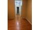 Hallway with wood-look floors and access to bedrooms at 3812 Ormond Beach St # 204, Las Vegas, NV 89129