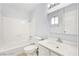 Clean bathroom with white vanity and shower/tub combo at 5388 Swenson St # 26, Las Vegas, NV 89119