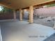 Covered patio with concrete flooring and support columns at 7621 Ribbon Rock Ct, Las Vegas, NV 89139