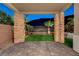 Spacious backyard with a hot tub, artificial turf, and a mountain view at 49 Strada Moscato, Henderson, NV 89011