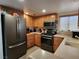 Well-equipped kitchen with modern appliances at 2106 Pebble Creek Ln, Laughlin, NV 89029