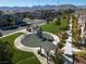 Community playground and park with homes nearby at 10631 Sariah Skye Ave, Las Vegas, NV 89166