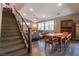 View of staircase and living area with hardwood floors at 816 Stannard Ct, Henderson, NV 89052