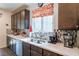 Well-equipped kitchen featuring double sink and modern appliances at 816 Stannard Ct, Henderson, NV 89052