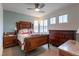 Spacious bedroom with wood flooring and antique furniture at 816 Stannard Ct, Henderson, NV 89052