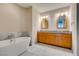 Bathroom with a large soaking tub and double vanity at 4525 Dean Martin Dr # 2704, Las Vegas, NV 89103