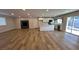 Open living room and kitchen with hardwood floors at 4959 Idaho Ave, Las Vegas, NV 89104