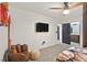 Bedroom with a baseball-themed sitting area and a view of the bathroom at 2917 Whalers Cove Cir, Las Vegas, NV 89117