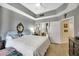 Spacious primary bedroom with large bed, dresser, and ensuite bathroom access at 67 E Agate Ave # 401, Las Vegas, NV 89123