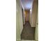 Clean hallway with carpeted flooring at 3445 Blue Ash Ln, Las Vegas, NV 89122