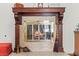 Ornate fireplace with a brass screen and marble surround at 3841 Hildebrand Ln, Las Vegas, NV 89121