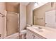 Clean bathroom with a shower/tub combo, vanity, and a mirror at 6137 Talbot Springs Ct, North Las Vegas, NV 89081