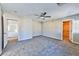 Bright bedroom with ceiling fan and walk-in closet at 6137 Talbot Springs Ct, North Las Vegas, NV 89081