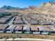 Aerial view of a new residential community nestled in the mountains at 2230 Pigeon Hawk St, Las Vegas, NV 89138