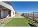 Landscaped backyard with fire pit and mountain views at 2230 Pigeon Hawk St, Las Vegas, NV 89138