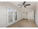 Bright bedroom with double closets and ceiling fan at 2368 Winterwood Blvd, Las Vegas, NV 89142