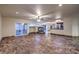 Spacious living room featuring a fireplace and tile flooring at 527 Leap Frog Ave, Las Vegas, NV 89183