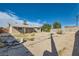 Backyard view of a house with a large open area at 4323 Ridgedale Ave, Las Vegas, NV 89121