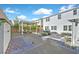 Landscaped backyard with pergola and seating area at 10167 Bismarck Palms Ave, Las Vegas, NV 89166