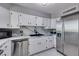 Updated kitchen featuring stainless steel appliances and marble countertops at 3111 Bel Air Dr # 26H, Las Vegas, NV 89109