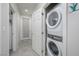 Stackable washer and dryer in a well-lit laundry room at 2675 Chinaberry Hill St, Laughlin, NV 89029