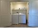 Convenient laundry room with washer and dryer at 4273 Venus Falls Ave, North Las Vegas, NV 89084