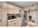 Kitchen boasts ample counter space and stainless steel appliances at 7705 Allano Way, Las Vegas, NV 89128