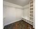 Large walk-in closet with built-in shelves and hanging rods at 7942 Quail Mountain Ln, Las Vegas, NV 89131