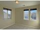 Bedroom with two windows offering great natural light at 9720 Pan Falls St, Las Vegas, NV 89178