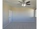 Bright bedroom with ceiling fan and neutral decor at 9720 Pan Falls St, Las Vegas, NV 89178