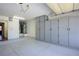 Garage with ample storage cabinets and epoxy flooring at 2904 Linkview Dr, Las Vegas, NV 89134