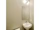 Simple bathroom with pedestal sink and mirror at 2715 W Pebble Rd # 505, Las Vegas, NV 89123