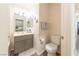 Guest bathroom with single vanity and toilet at 2285 Canyon Song Ave, Laughlin, NV 89029