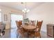 Bright dining room featuring a wood table and chairs, perfect for Gathering meals at 2285 Canyon Song Ave, Laughlin, NV 89029