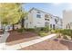 Condo building exterior with walkway and landscaping at 700 Carnegie Street # 2312, Henderson, NV 89052