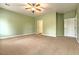 Well-lit bedroom featuring ceiling fan and ample space at 6781 Stubblefield Dr, Pahrump, NV 89061