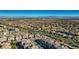 Community overview, featuring numerous homes and city views at 12113 Rojo Roma Ave, Las Vegas, NV 89138