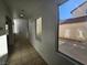 Bright hallway with tile floors and backyard view at 6141 Glenborough St, Las Vegas, NV 89115