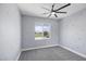 Bright bedroom with playful polka dot wall design and window view at 10028 Sharp Ridge Ave, Las Vegas, NV 89149