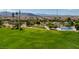 Community park with playground, splash pad, and mountain views at 10028 Sharp Ridge Ave, Las Vegas, NV 89149