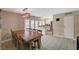 Kitchen and dining area with a spacious wooden table at 3933 Manford Cir, Las Vegas, NV 89104