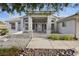 House exterior with covered entryway and stone landscaping at 639 Marina Dr, Boulder City, NV 89005