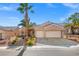 Attractive single-story home with two-car garage and desert landscaping at 3413 Cantura Bluff Ave, North Las Vegas, NV 89031