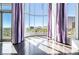 Bright living room featuring large windows and city views at 360 E Desert Inn Rd # 807, Las Vegas, NV 89109