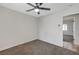 Empty bedroom with neutral walls, carpeting, and a ceiling fan at 5132 Spencer St, Las Vegas, NV 89119