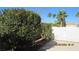 Backyard with gate and large shrubs at 8637 Stone Harbor Ave, Las Vegas, NV 89145