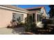 Backyard view showing patio, landscaping and screened enclosure at 8637 Stone Harbor Ave, Las Vegas, NV 89145